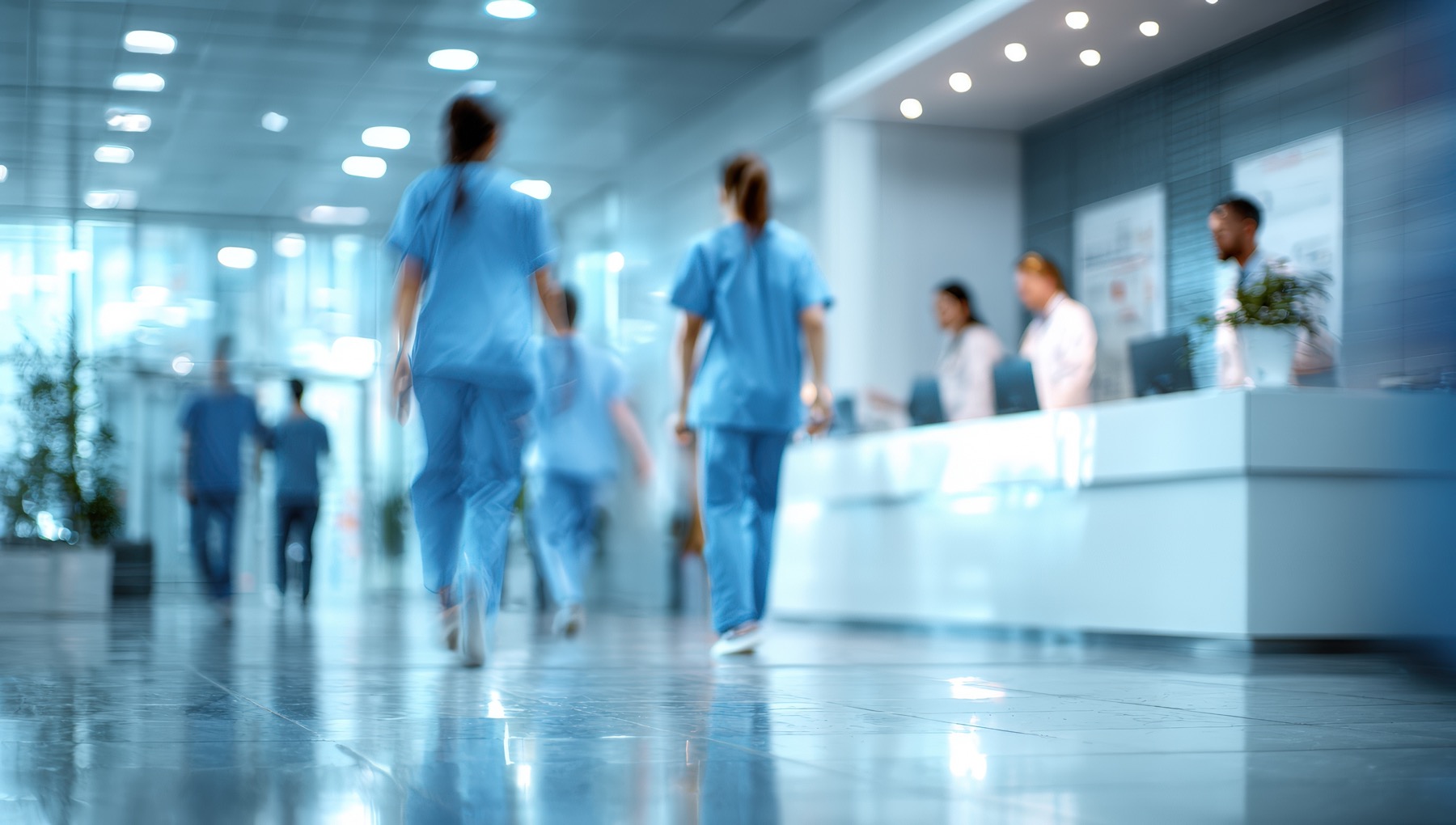 Healthcare providers in hospital corridor